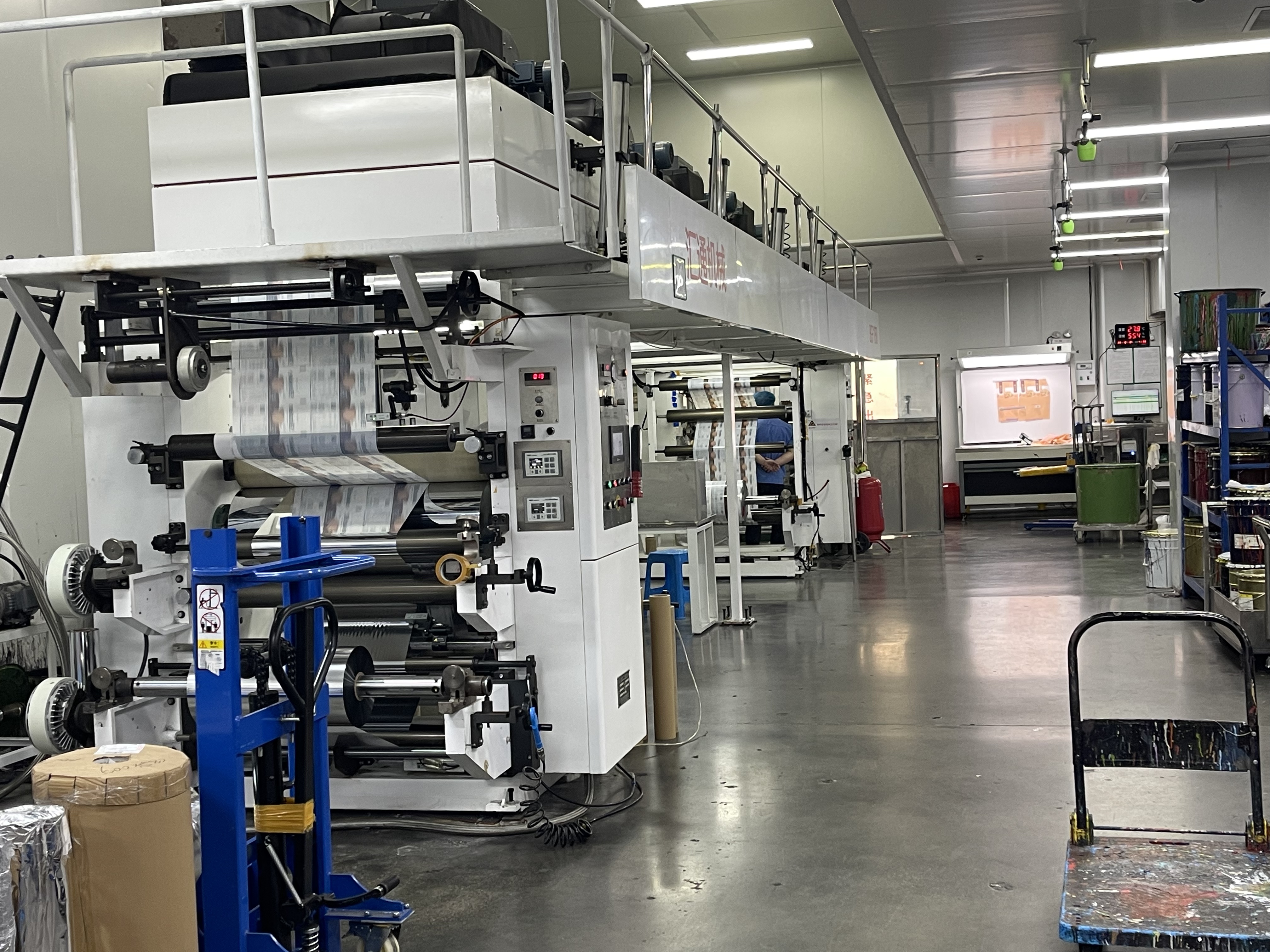 Printed film lamination Printed packaging film undergoing lamination in the BioPouches production facility